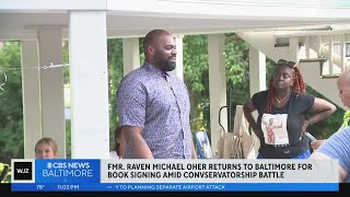 Michael Oher greets fans at a Baltimore book signing amid lawsuit to end his conservatorship