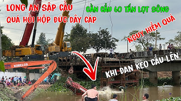 Long an sập cầu lọt xe cẩu 80 tấn xuống sông đức cáp trong lúc lôi cần cẩu lên quá hồi hộp.
