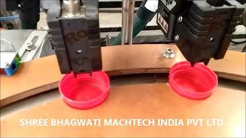 Double Head Wad inserting machine with cap elevator and hot glue attachment