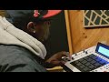 Black metaphor making a beat on the mpc 2500