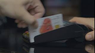 Hand Swiping Credit Card