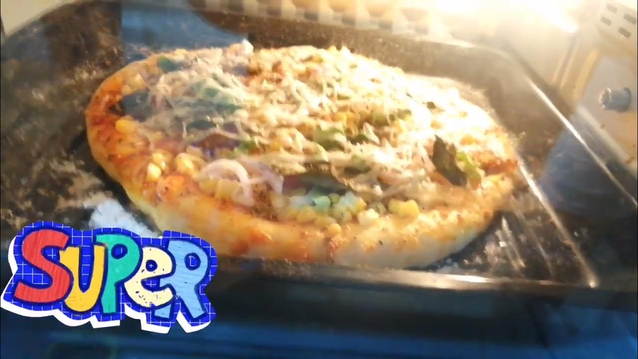 pizza made by homepizza in OTGcheesy pizza YouTube