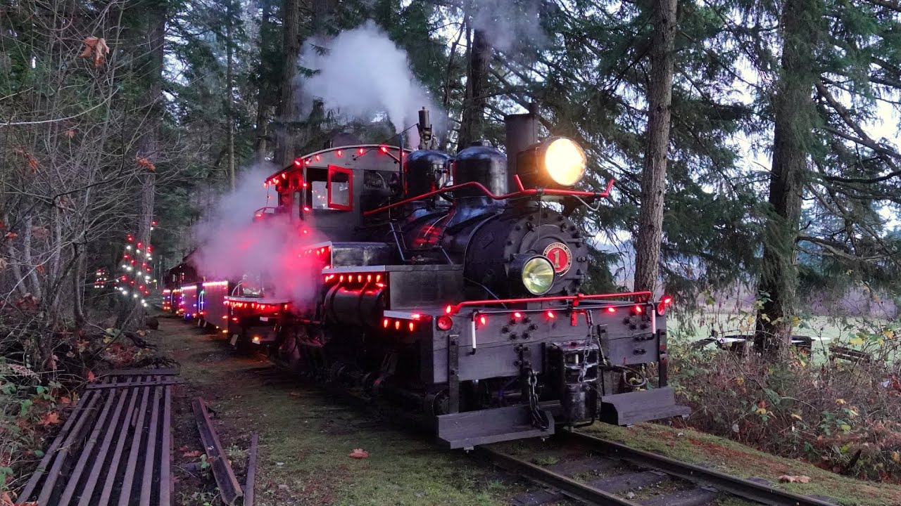Shay Steam Locomotive Working Hard Pulling a Passenger Train