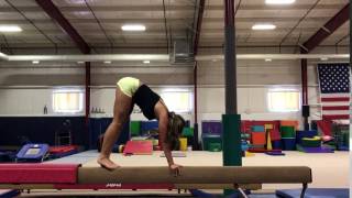Needle Handstand on Beam