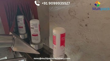 Electric shrink tunnel with rotating Puck system for Empty bottle | Multipack Machinery |