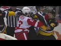 Sidney Crosby and Moritz Seider going at it during scrum