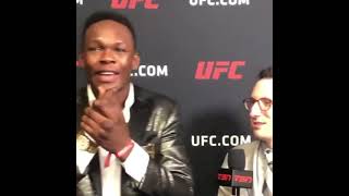 Israel Adesanya reacts to Jorge Masvidal flying knee fastest knockout