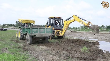 Mahindra Earthmaster sx Backhoe Loader Loading Soil in John Deere Tractor - Mahindra Backhoe