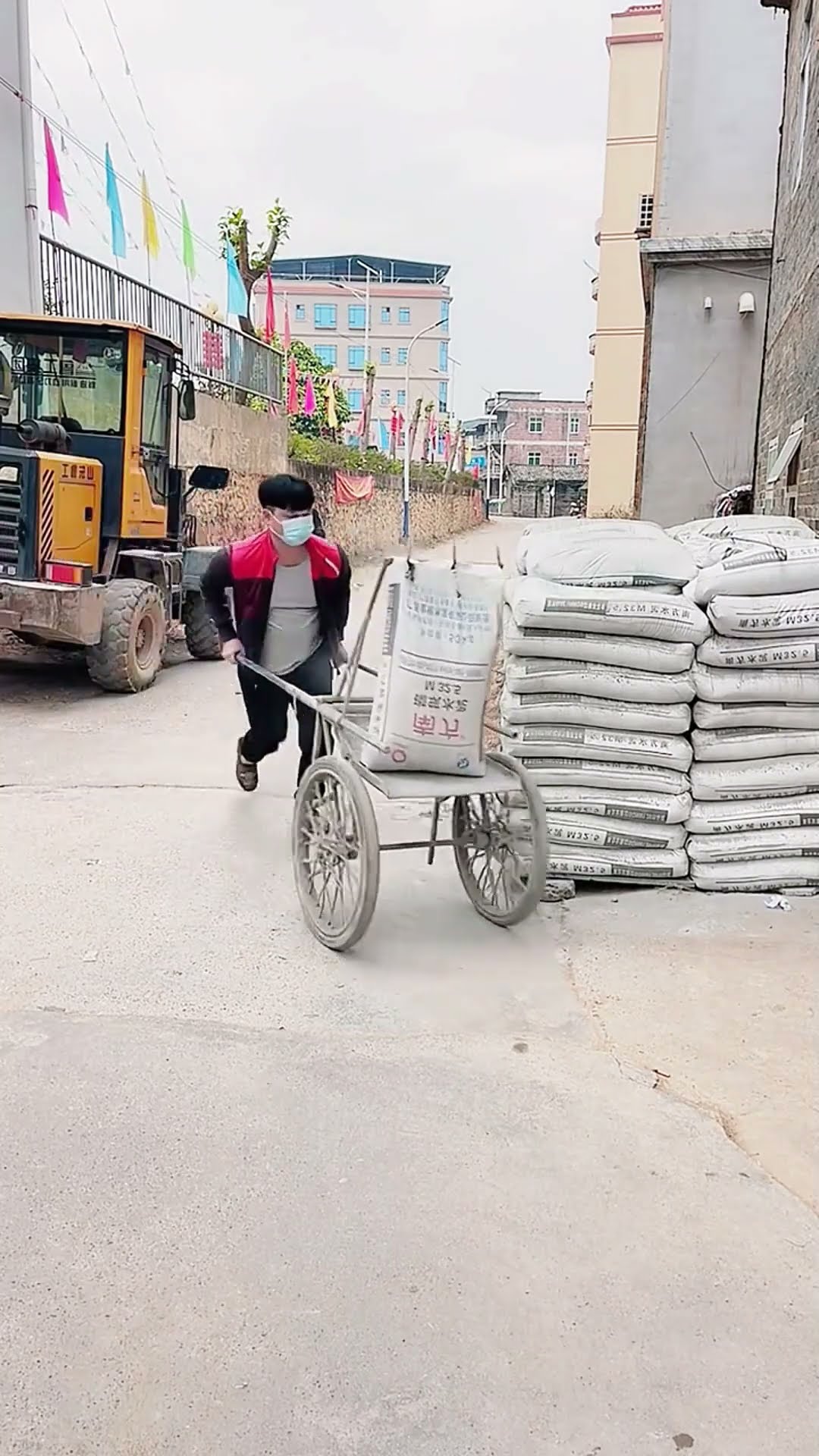 The process of transporting cement bags- Good tools and machinery make work easy