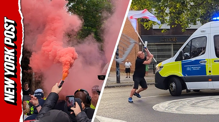 Police clash with anti-immigration protesters outside hotel housing asylum seekers