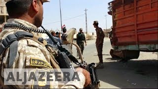 Sunni and Shia forces join hands in Mosul fight - YouTube