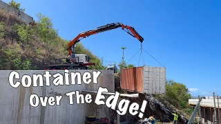 Moving a Shipping Container on the Edge of a Hill