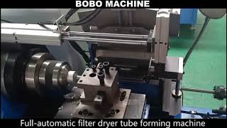 Full automatic filter dryer tube end spinning machine with direction change and mandrel