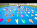 We Fly 100 Paper Airplanes At Once