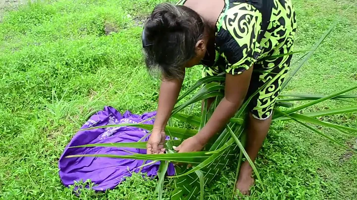 Weaving a basket called 'bwaabwa' from the coconut leaves
