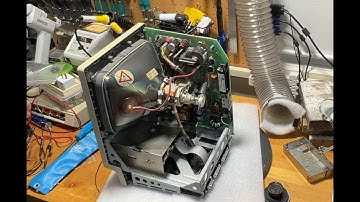 Preventing your Macintosh Plus from going "Bang" (Replacing the RIFA capacitors)