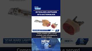 Star Wars lightsaber auction