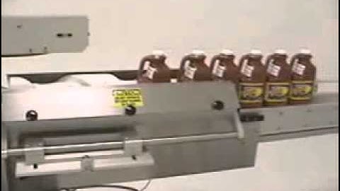 Quadrel | Labeling System | 3-Panel Large Plastic Container Label Application