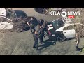 Pursuit driver in custody after ditching stolen van, getting into another vehicle in El Sereno area