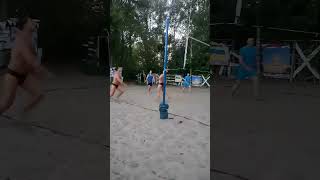 Beach volleyball, great throw under the net.