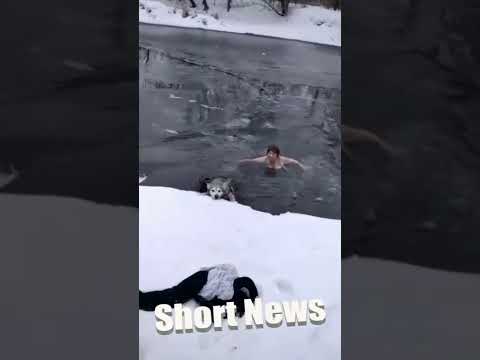 Moment Brave Russian Woman, 65, Jumps Into Freezing Water To Save Husky Trapped By Ice From Drowning