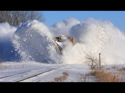 Awesome Powerful Train plow through snow railway tracks HD 