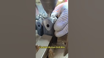 Insert Carbide Buttons into a Drill Bit