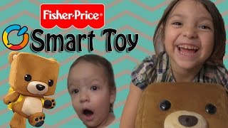 Ari unboxing the Fisher-Price Smart Interactive Bear Toy