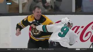 Zdeno Chara fights Evander Kane after a high hit, on February 26, 2...