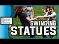 Swinging statues