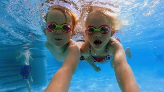 elizabeth swims underwater pool flying swimming play