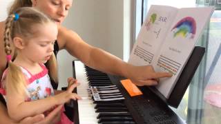 Piano Lesson with 3yo toddler. Tutorial how to use Piano Games Books by Natasha Mikhaylova screenshot 5