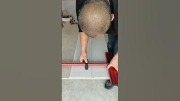 Bricklayer laying tiles Bricklayer tools Expert tiling New tools Push knife