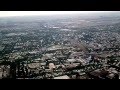 Взлет из аэропорта Алматы с видом на город