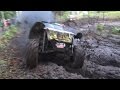 Off-Road vehicle mud race in forest