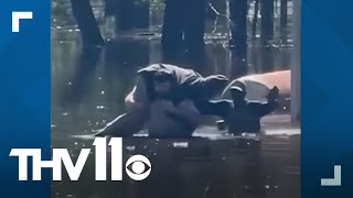 Arkansas deputy saves couple from floodwaters