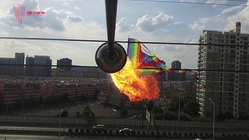 IMG Flame throwing #drones used for cleaning hangings on power lines in #Kunming