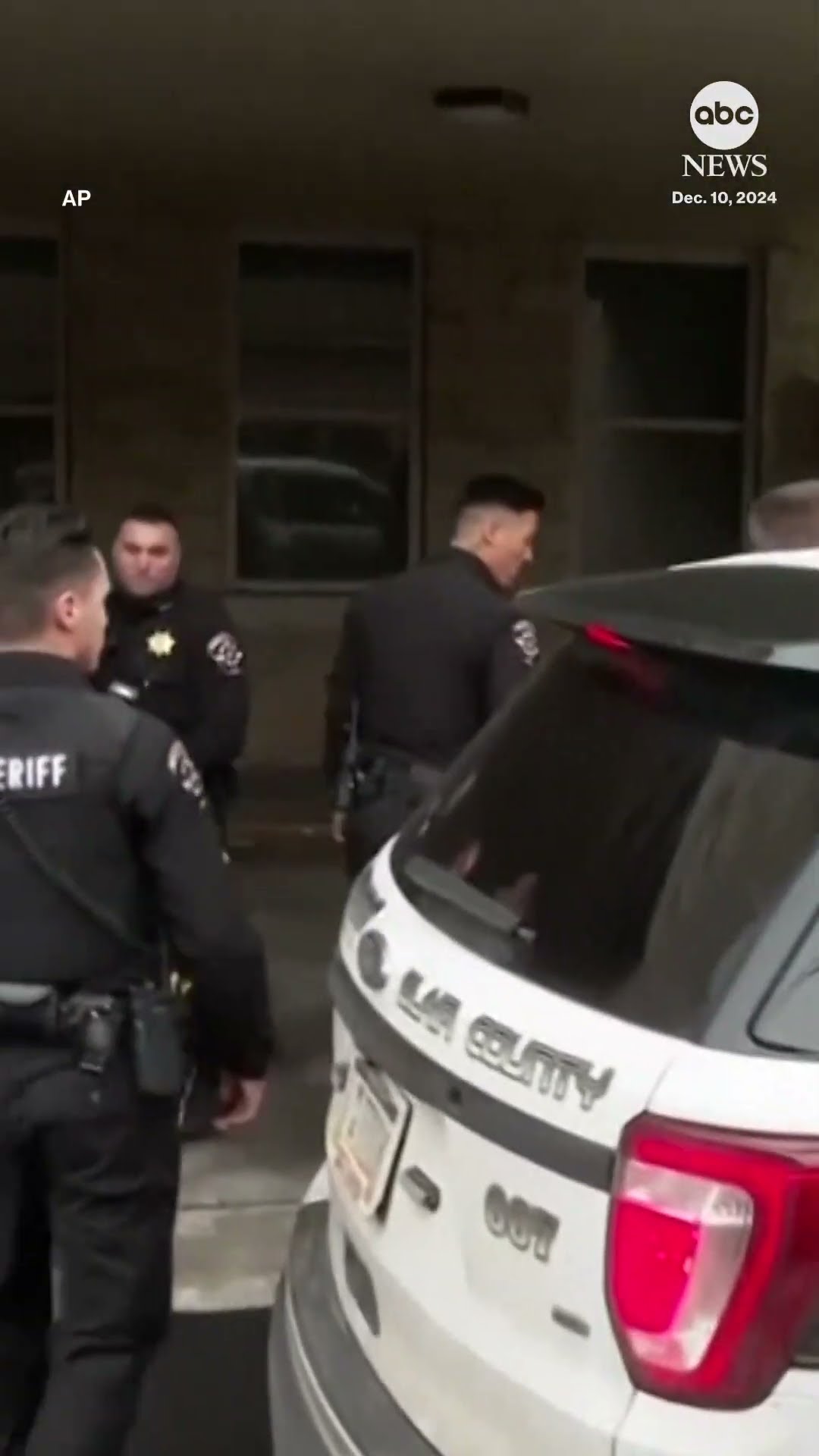 UnitedHealthcare CEO shooting suspect shouts as he's shuffled into court