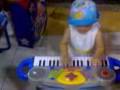 Erin 16 months Playing Electronic Piano