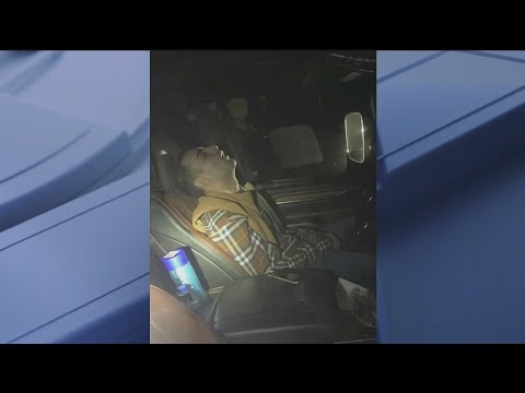 Man asleep behind wheel on I-95: deputies - YouTube