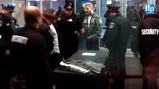 Heckler ejected from London Cosby show.