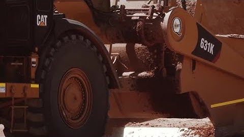 Delivering more for Q.H. & M. Birt | Cat® 631K Wheel-Tractor Scrapers