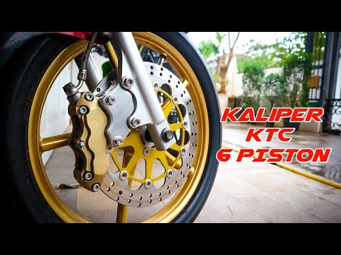 Video: Apa itu kaliper 6 piston?