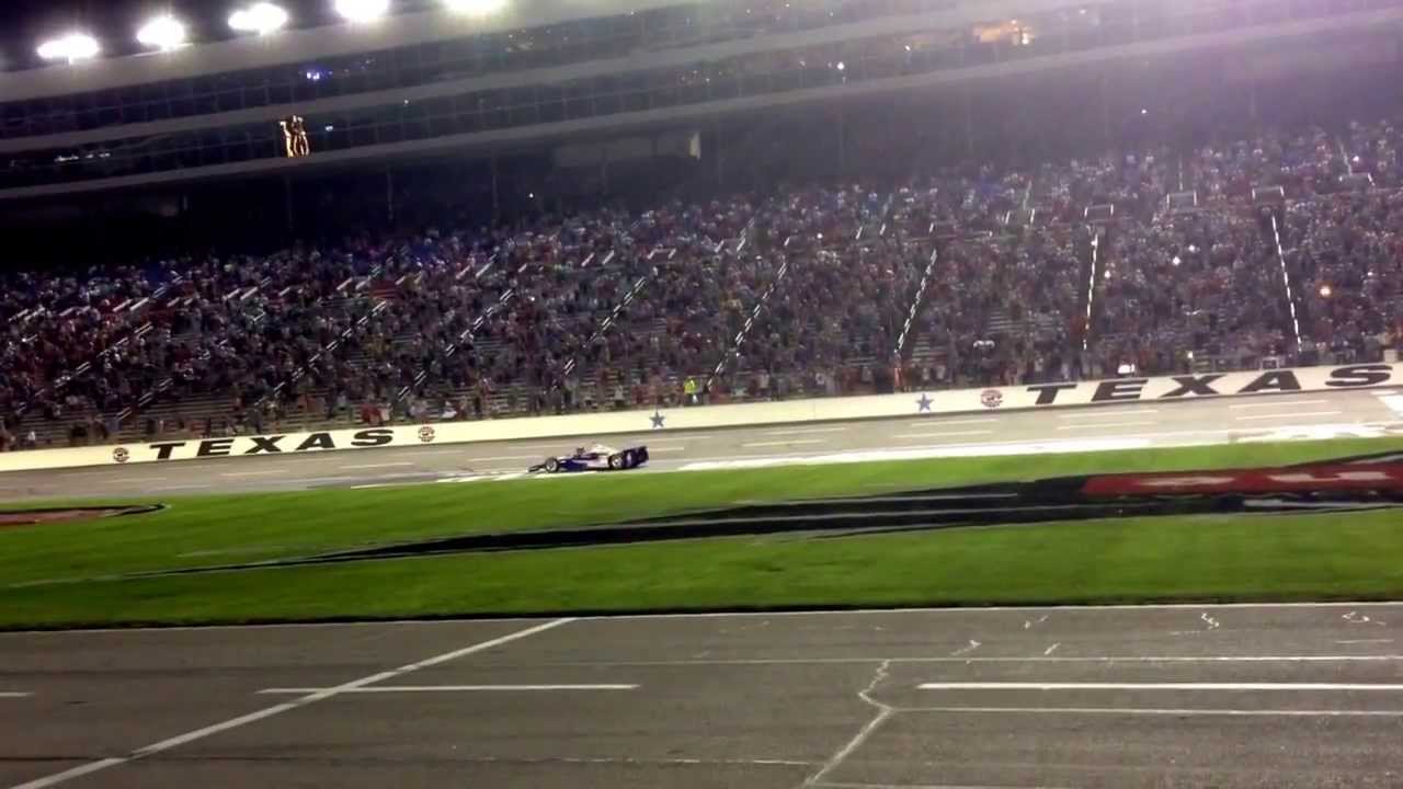Helio Castroneves Spider-Man climbing the fence @ Texas Motor Speedway after winning Firestone 550