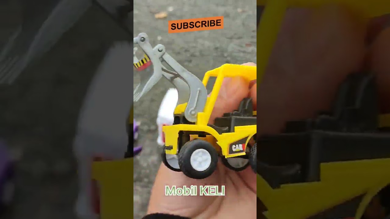 Excavator pencapit kayu 