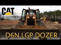 CAT D6N LGP dozer pushing dirt