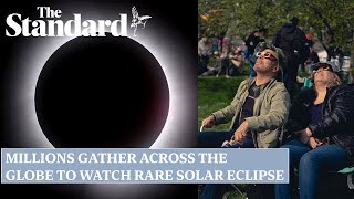 Moon blocks out sun over Mexico as crowds cheer eclipse