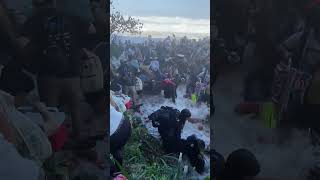 Spectators Washed Away by a Giant Wave