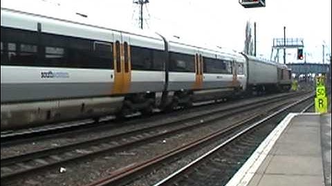 EWS 67026 moves Southeastern class 465, out of Doncaster Station.