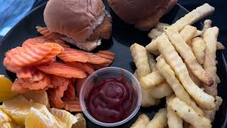 Chicken sliders, fries, oranges and carrots for lunch